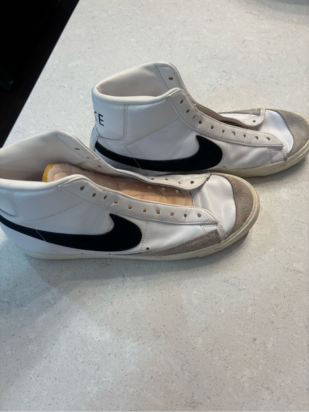 Nike Men’s White and Black High-Top Sneakers